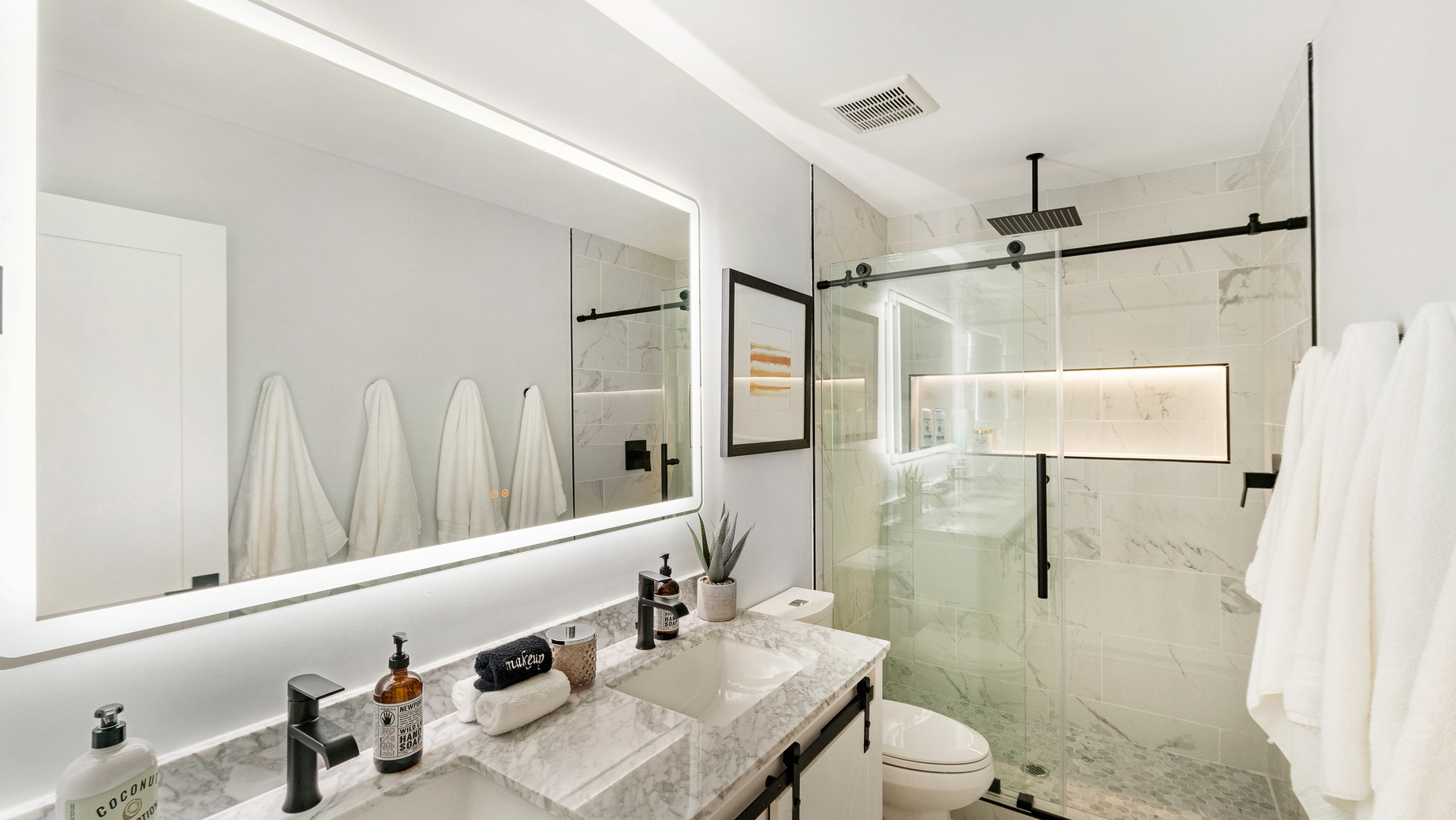 Finished white bathroom remodel
